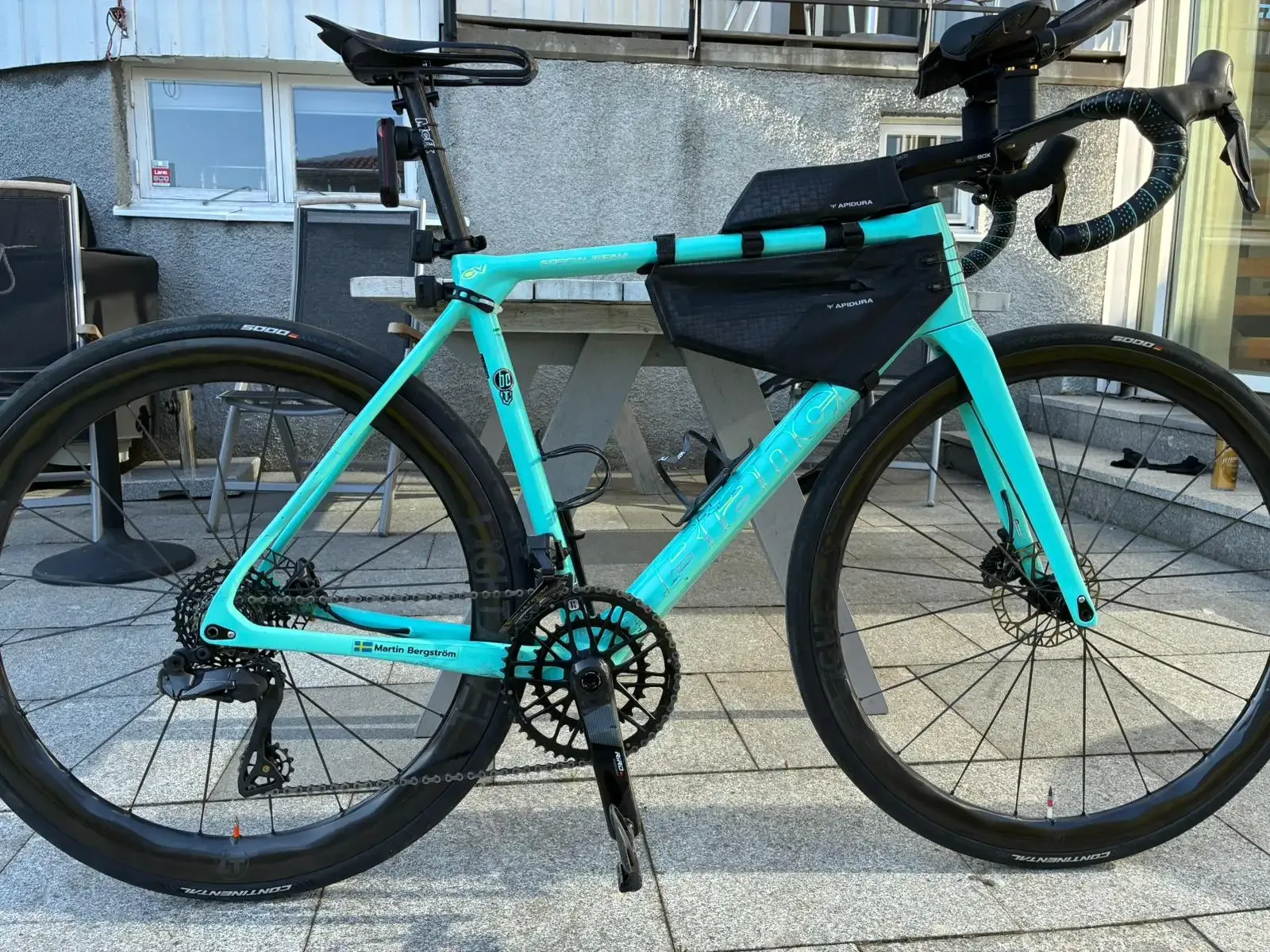 Road-bike-fitted-with-LT-WR25-38-carbon-wheelset-parked-on-outdoor-stone-patio